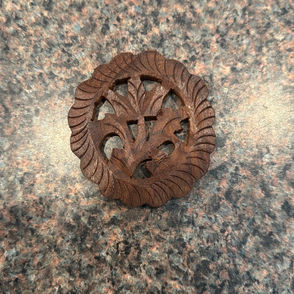 Carved wood trivet